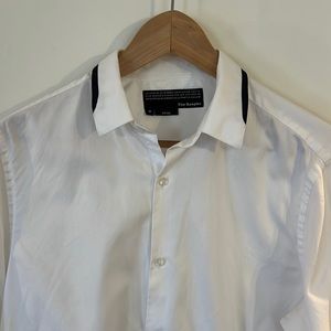 White dress shirt from The Kooples with navy blue details on cuffs and collar